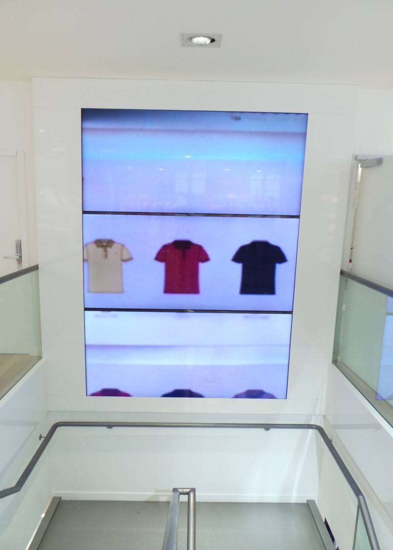 Intégration et équipement de systèmes audiovisuels et vidéos pour la boutique Lacoste à Lyon